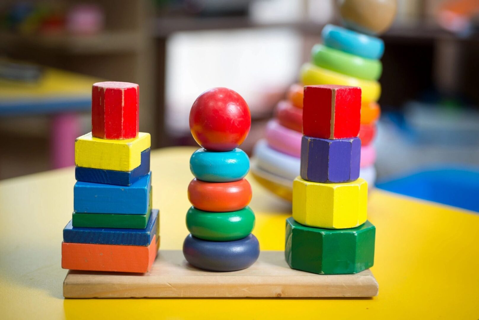 A wooden board with many different colored blocks